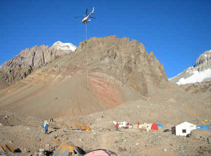 Toilet barrel being removed from Aconcagua base camp